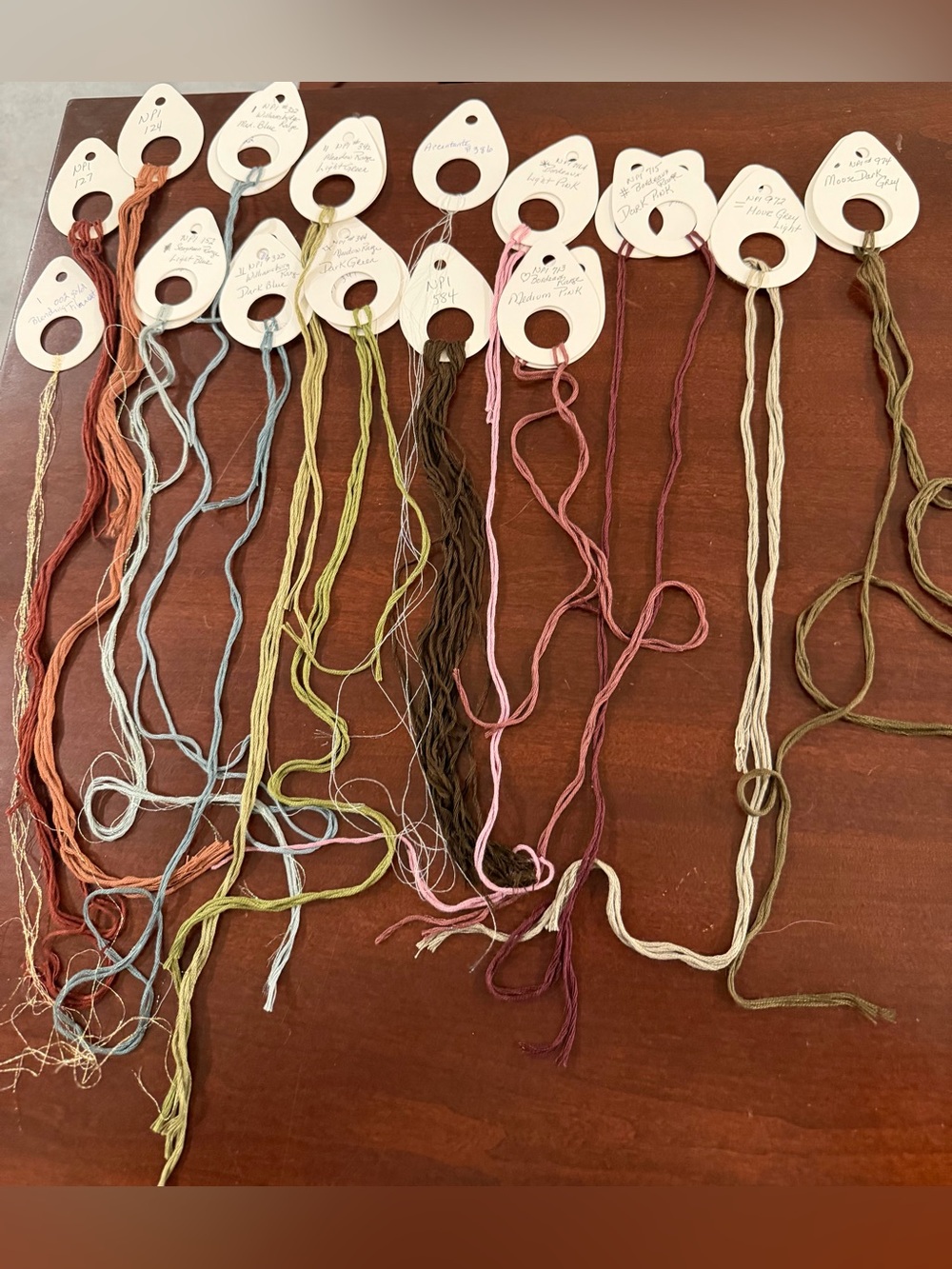 25 Assorted Needlepoint Inc Embroidery Floss on tear-drop floss organizers